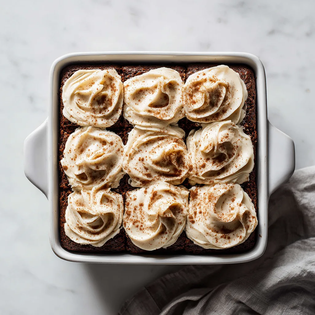 Dark & Moist Molasses Gingerbread Cake with Cream Cheese Frosting: A Classic Holiday Dessert Worth Baking
